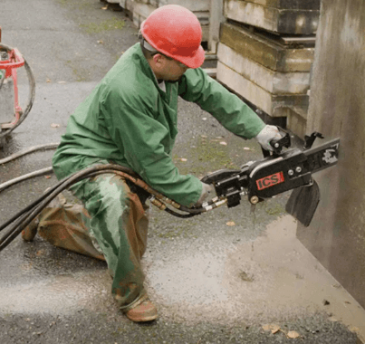 Hydraulic power pack supplying pressure to concrete cutting equipment