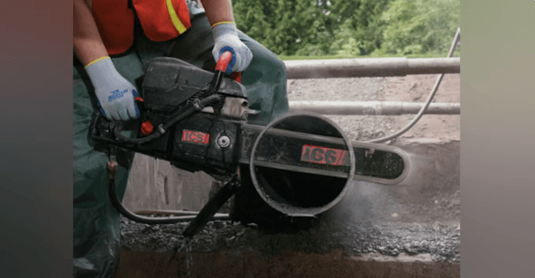 Walk-behind flat saw used for precision concrete cutting on a jobsite